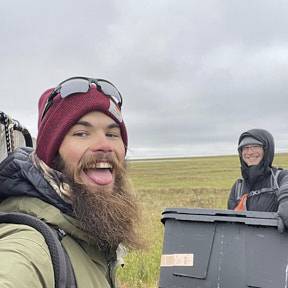 Taylor and Justin packing up field gear in Atqasuk